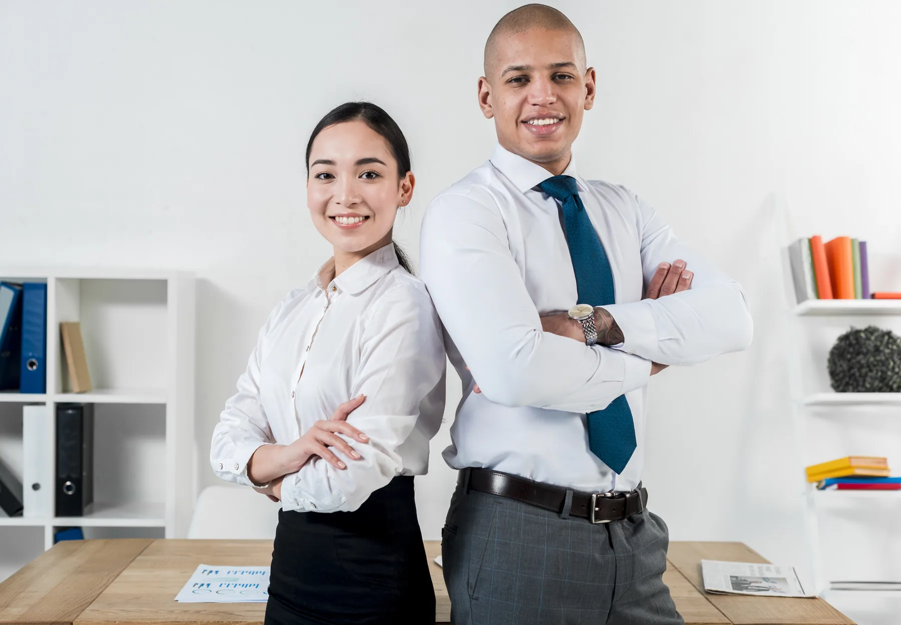 Corporate team wearing coordinated office uniforms
