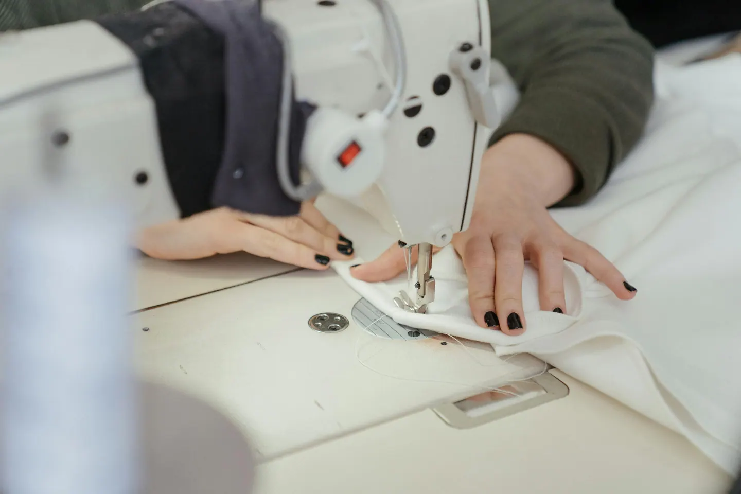 A close view of precision stitching during garment making